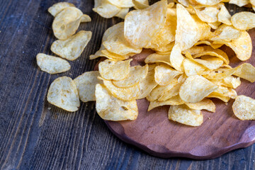 scattered potato chips with natural spices
