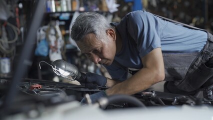 Fototapeta na wymiar Small enterprise customer service for automobile engine maintenance service