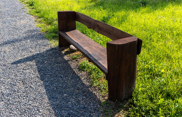 A simple wooden bench in the park