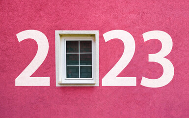 Happy new year 2023. Year 2023 on wall with window
