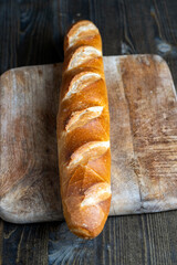 a whole wheat baguette, not cut into pieces
