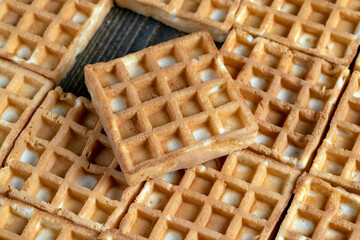 soft sweet waffles on the table, close up