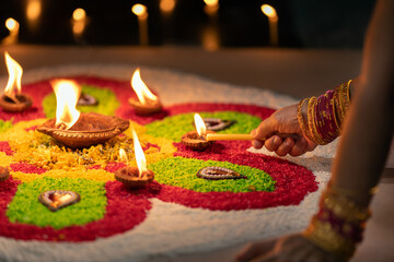 Traditional diya lamps lit during diwali celebration