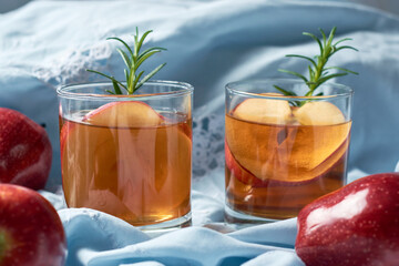 Apple cider or tea in cups, hot beverage for autumn.