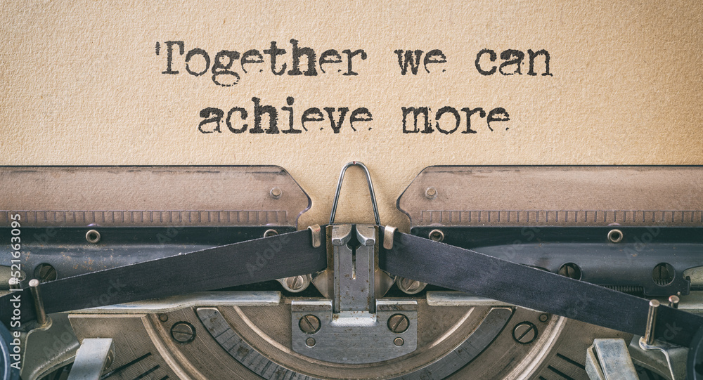 Wall mural vintage typewriter - together we can achieve more