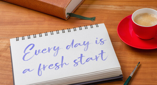  Notepad on a desk - Every day is a fresh start