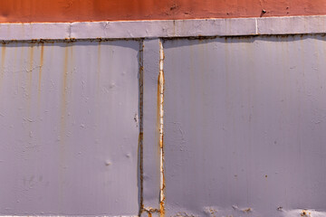 Part of the metal structure of an old steam locomotive