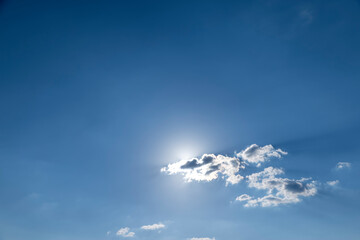 Blue sky with light clouds in windy weather