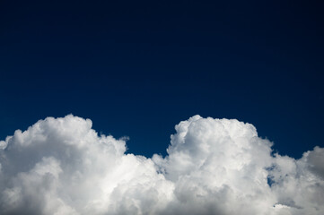 Naklejka na ściany i meble 白い雲と青空のアブストラクトイメージ 背景 クラウドスケープ
