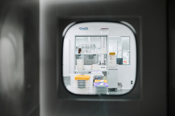 Women work in the lab. Conducts experiments on vaccines.