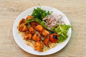 Chicken wings barbeque in a dish with BBQ grill sauce . Izgara tavuk kelebek sis kanat. Tavuk sis, gogus.