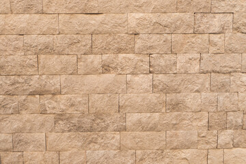 texture of beige stone wall with large stones
