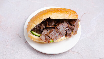 Beef doner kebab in plate top view isolated