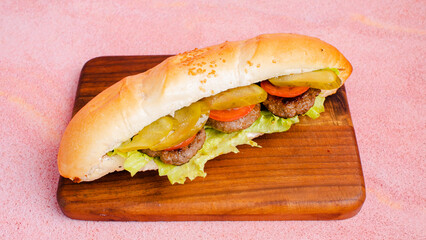 Beef kofta doner kebab on wooden tray top view isolated