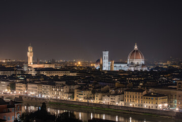 Fototapeta na wymiar Florence by night from the Piazzale Michelangelo looking at the Piazza della Signoria and Cathedral of Santa Maria del Fiore