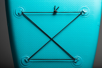 An elastic band for luggage and things on a sapbood is large.