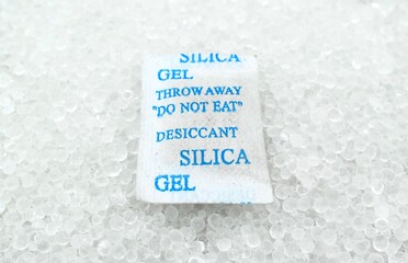 Sachet of new silica gel crystals. It is a desiccant. It adsorbs water vapor.