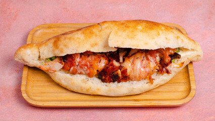 Chicken doner kebab in plate top view isolated