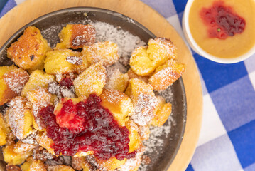 Kaiserschmarrn with apple sauce and cranberries jam. Image from above