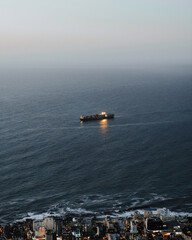 Fototapeta premium Cargo ship in the evening on he sea