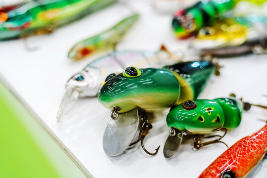 Fishing bait for predatory fish in the form of frogs. Wobblers for spin fishing green. Selective focus. Close-up