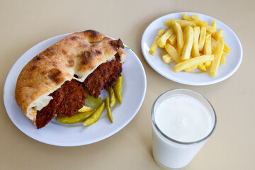 Meatball between bread (Turkish name : ekmek arasi kofte ) Izgara kofte. Manisa, Akcaabat, Akhisar  kofte