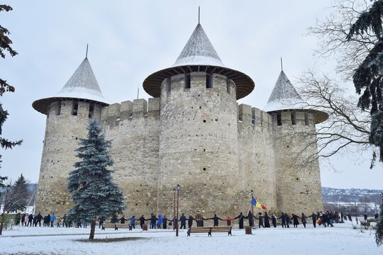 Soroca Castle, Soroca Citadel, Republic Of Moldova, Winter, Surrounded By People Dancing Hora.