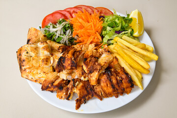 Chicken wings barbeque in a dish with BBQ grill sauce . Izgara tavuk kelebek sis kanat. Tavuk sis, gogus.