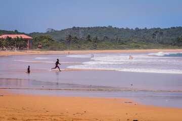 Fototapeta na wymiar Amazing View to the Sandy Atlantic Coastline of Axim Beach in Ghana, West Africa