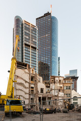 Urban renewal or Gentrification. Old buildings are being demolished to create space for new...