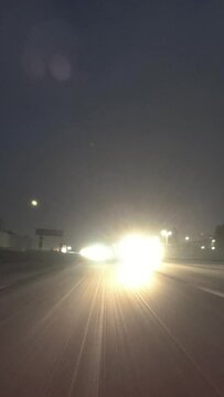 Night rear view vertical time lapse video on the 210 freeway near Los Angeles and Pasadena, California.