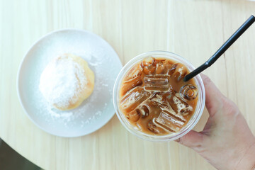 coffee, iced coffee or iced cappuccino coffee and bun