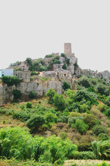 Sardinian village of Posada with the Castello della Fava tower. Sardinia, Italy