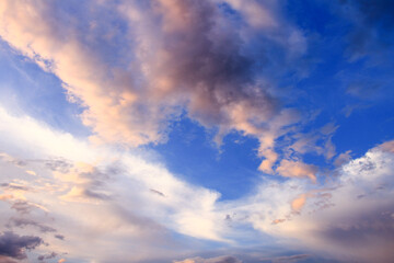 Naklejka na ściany i meble Beautiful blue sky with colorful clouds