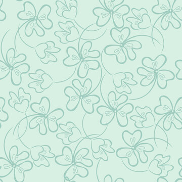 Beautiful vector floral seamless pattern. Abstract background with openwork blue flowers on a pale blue background. Elegant repeating design for decor, wallpaper, packaging, textile, print, tiles