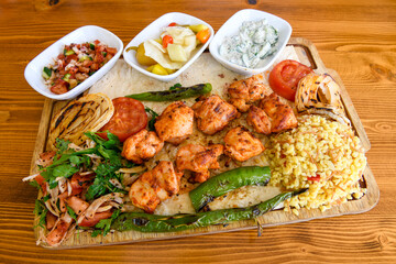 Chicken wings barbeque in a dish with BBQ grill sauce . Izgara tavuk kelebek sis kanat. Tavuk sis, gogus.
