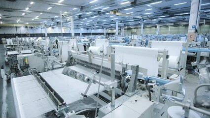 mechanization shop. industrial workshop in which the automatic production of fiberglass threads. fiberglass production. factory. industrial shop. automation