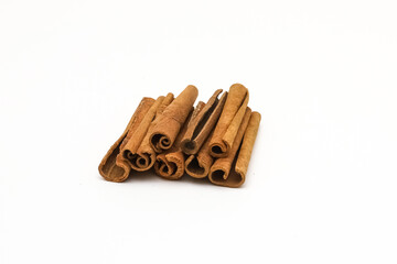 Cinnamon sticks on a white background. Close-up