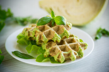 vegetable waffles cooked with herbs in a plate