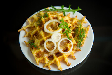 fried potato cheese vegetable waffles with bacon and onions