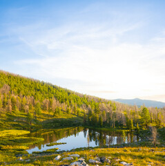 green mountain valley at the sunset, beautiful mountain travel landscape