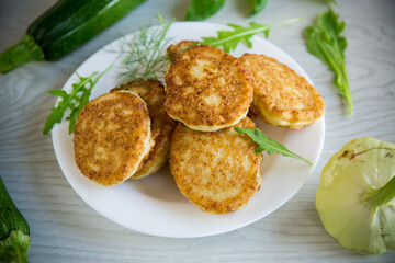 fried vegetable pancakes from squash and zucchini with herbs