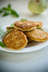 fried vegetable pancakes from squash and zucchini with herbs
