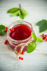 sweet summer jam from ripe red currants in a jar