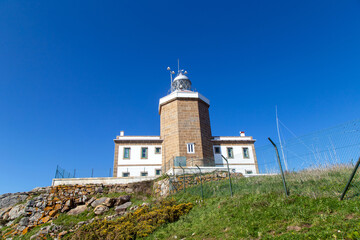 Fototapeta na wymiar Faro de Finisterre (1853). Costa de la Muerte, A Coruña, Galicia, España. 