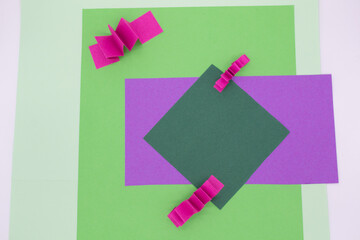 Abstract background in green, pink and purple colors with 3D paper elements, zig zag pattern . As a...