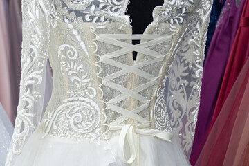 Lace on a white wedding dress close-up