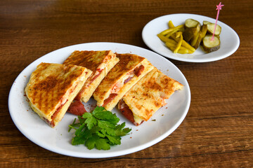 Turkish karisik atom  tost ( kasarli bazlama tost) . Sucuklu, Kasarli, kavurmali karisik Ayvalik tost. Flat baked bread toasted
