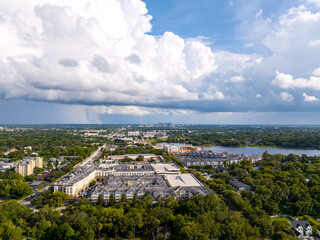 Aerial view of Maitland Florida with downtown Orlando in the distance with rain showers. June 27, 2022