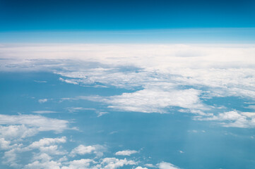 Fototapeta na wymiar beautiful blue sky with white clouds heaven horizon over the planet earth world, view from the airplane or satellite. atmosphere or stratosphere space layer. astronomy and geology sciense nature